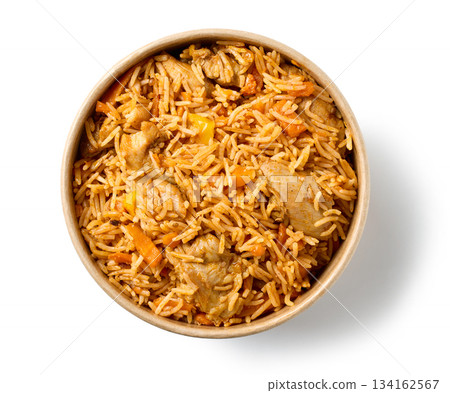 take away box of spicy rice with chicken meat and carrots 134162567