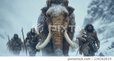 Primitive humans engaged in mammoth hunt in snowy mountains during prehistoric era 134162619
