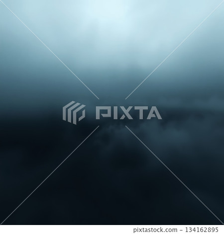 Dense black ground fog spreads across the floor, forming a smooth misty layer. 134162895