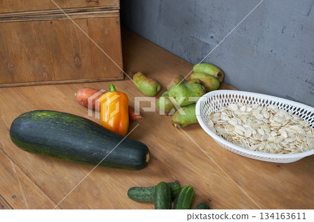 The vegetables are on the table. 134163611