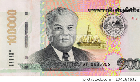 State financial authority issued Laos 100000 Kip cash banknote with official government validation 134164632