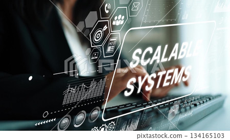 Professional woman working on scalable systems with digital interface showing graphs and icons for business technology success. Asymptotic smart data analytic Professional woman working on scalable systems with digital interface showing graphs and icons for business technology success. Asymptotic smart data analytic 134165103
