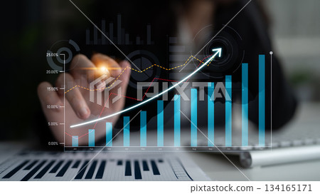 Business Person Analyzing Growth Chart with Projections in a Modern Office Environment, Focusing on Data Presentation and Analysis Techniques Scalp 134165171