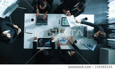 Top view of smart manager standing and present marketing plan. Directorate. Top view of smart manager standing and present marketing plan. Directorate. 134165233
