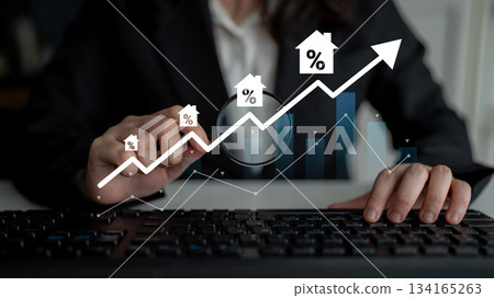 Business professional analyzing real estate market trends using magnifying glass to focus on percentage growth in investment opportunities and financial data Gantry 134165263