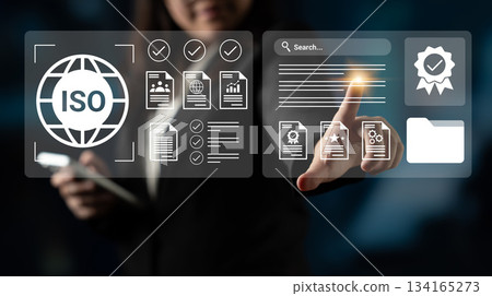 Business Professional Engaging with ISO Compliance Interface and Digital Document Management for Quality Assurance Improvement Gantry 134165273