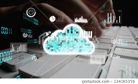 Conceptual image of digital interaction with cloud computing technology and data visualization trends in a modern workspace environment xenic Conceptual image of digital interaction with cloud computing technology and data visualization trends in a modern workspace environment xenic 134165359