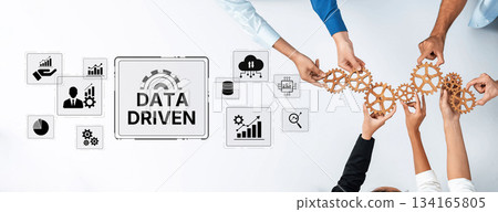 Collaborative Teamwork with Gears Symbolizing Data-Driven Decision Making and Business Analytics in Modern Workplace Setting Trope 134165805