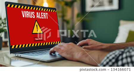 Virus warning alert on computer screen detected brisk cyber threat 134166071