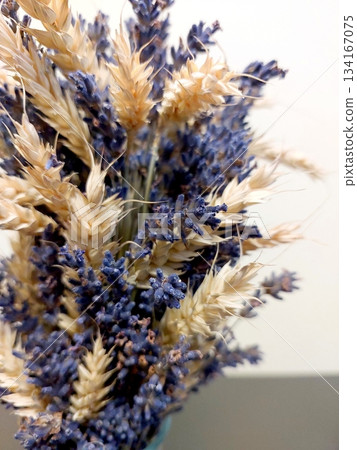 Wheat Ears and Lavender Arranged in a Simple Display for Home Decoration in a Modern Setting 134167075