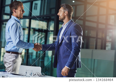 Business people, handshake and b2b success or partnership, agreement and networking in office. Corporate, men and executive shaking hands with new client, merger or collaboration on deal or job Business people, handshake and b2b success or partnership, agreement and networking in office. Corporate, men and executive shaking hands with new client, merger or collaboration on deal or job 134168464