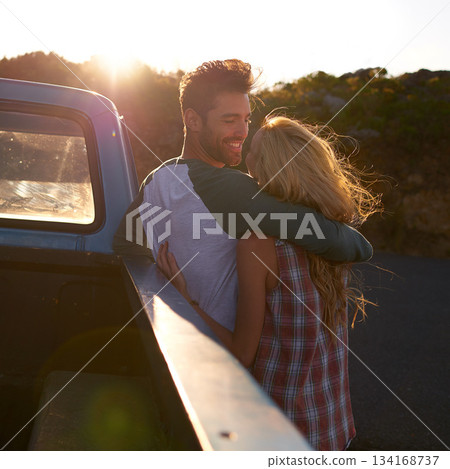 Hug, truck or happy couple on road trip in nature on romantic holiday vacation for bonding on date. Car, travel or people hugging to embrace on fun summer weekend break with romance in park together 134168737