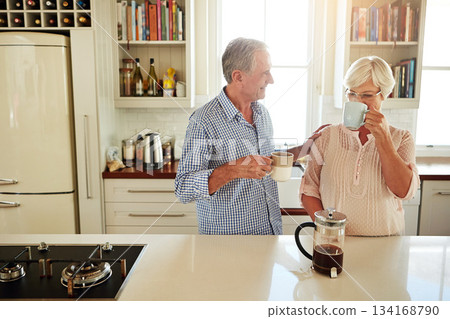 Happy, coffee or old couple speaking in kitchen at home bonding or enjoying quality morning time together. Love, affection or mature man talking, relaxing or drinking espresso tea with woman at home Happy, coffee or old couple speaking in kitchen at home bonding or enjoying quality morning time together. Love, affection or mature man talking, relaxing or drinking espresso tea with woman at home 134168790