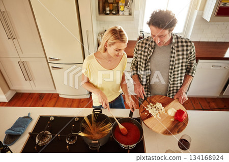 Top view, food or couple in the kitchen cooking with healthy vegetables for lunch meal or dinner together. Love or woman helping or talking to mature husband in meal preparation in Sydney, Australia 134168924