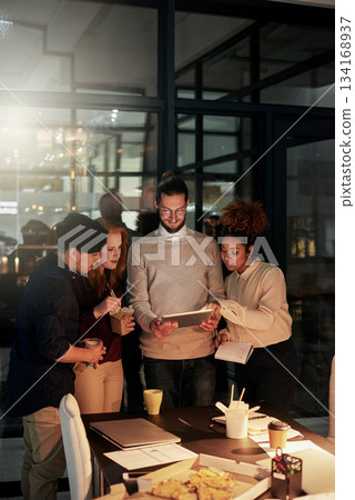 Night business, young people and tablet technology of planning, research or collaboration in dark office. Diversity, digital ideas and working late online in designer agency, teamwork or productivity 134168937
