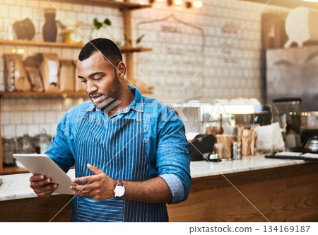 Search, tablet and manager with man in cafe for online, entrepreneurship and startup. Waiter, technology and food industry with small business owner in restaurant for barista, network and coffee shop Search, tablet and manager with man in cafe for online, entrepreneurship and startup. Waiter, technology and food industry with small business owner in restaurant for barista, network and coffee shop 134169187
