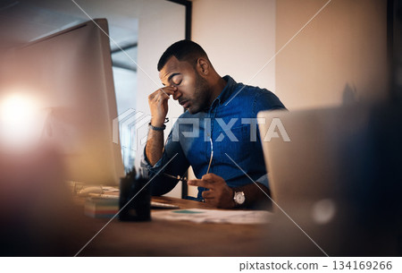 Headache, eye strain and businessman in the office at night working on deadline project. Burnout, stress and professional male employee with migraine doing research on computer overtime in workplace. Headache, eye strain and businessman in the office at night working on deadline project. Burnout, stress and professional male employee with migraine doing research on computer overtime in workplace. 134169266