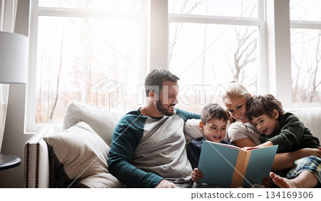 Family, reading book with parents and children, happiness at home with story time and learning. Love, relationship and happy people bonding and care in living room with education and development Family, reading book with parents and children, happiness at home with story time and learning. Love, relationship and happy people bonding and care in living room with education and development 134169306