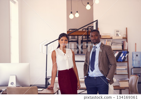 Portrait, serious people and team in office for collaboration, professional commitment and pride about us with mockup. Focused african man, woman and confident employee partnership in business agency 134169361