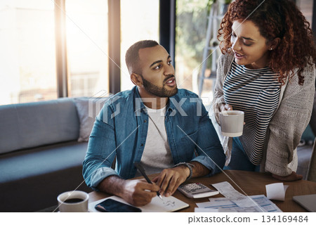 Couple with list for budget, finance and bills with paperwork of financial debt, talking about savings and income. Mortgage, insurance and taxes, African man and woman at table with home bookkeeping Couple with list for budget, finance and bills with paperwork of financial debt, talking about savings and income. Mortgage, insurance and taxes, African man and woman at table with home bookkeeping 134169484