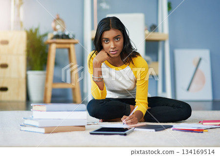 Learning, student portrait and woman writing in notebook, journal or planner for university report, project or information summary. Education, study and serious person studying for test on home floor Learning, student portrait and woman writing in notebook, journal or planner for university report, project or information summary. Education, study and serious person studying for test on home floor 134169514