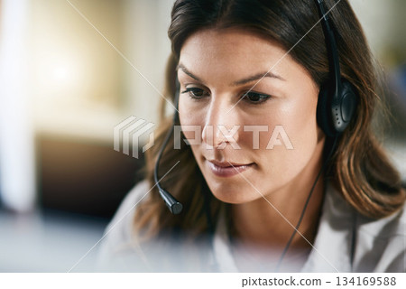 Communication, face or woman in call center consulting, speaking or talking at customer services. Virtual assistant, focused or serious sales consultant in telemarketing or telecom company help desk Communication, face or woman in call center consulting, speaking or talking at customer services. Virtual assistant, focused or serious sales consultant in telemarketing or telecom company help desk 134169588
