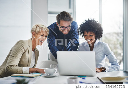 Discussion, teamwork and business people with a laptop working on company project in the office. Technology, collaboration and team doing corporate research in together with technology in workplace. 134169723