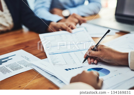 Business people, hands and writing on document in meeting for corporate finance, budget or expenses at office. Hand of employee in financial planning, paperwork or marketing for company statistics 134169831