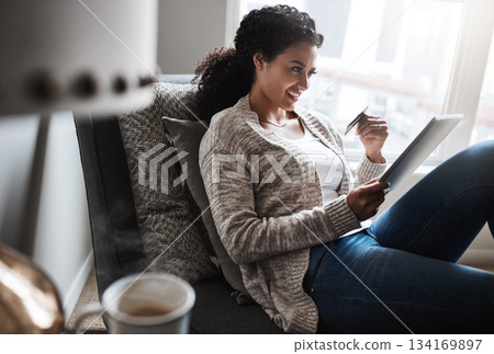 Credit card, tablet and girl and online shopping, ecommerce in home or paying for product, retail or internet finance. Black woman, banking and money for purchase, digital payment or delivery 134169897