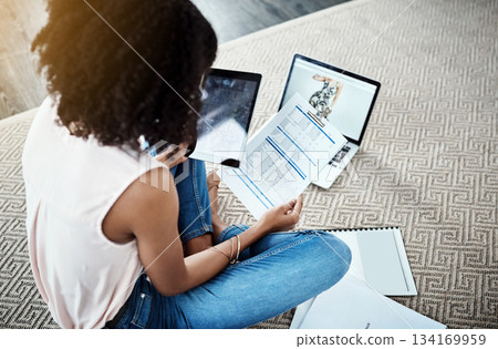 Tablet, finance and woman with work from home budget, documents and planning startup, fashion and business. Person on digital tech, carpet floor and analysis of profit, taxes and financial paperwork 134169959