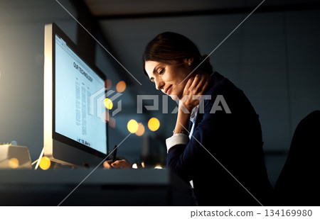 Focus, desktop and businesswoman at night or employee in the office or thinking with pen. Corporate, dark and female manager contemplate or computer and stationery in the evening at workplace Focus, desktop and businesswoman at night or employee in the office or thinking with pen. Corporate, dark and female manager contemplate or computer and stationery in the evening at workplace 134169980