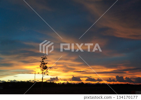 Beautiful orange sunset sky Beautiful orange sunset sky 134170177