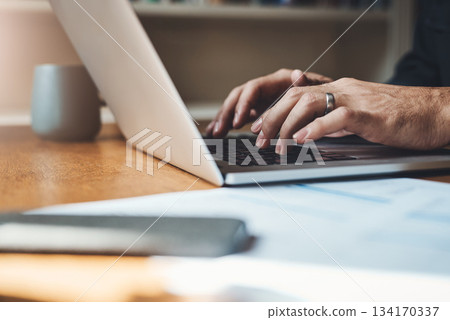 Hands, closeup and man with laptop in home office for finance, review or budget planning. Fingers, keyboard and male person paying bills online for savings, investment and mortgage or startup loan Hands, closeup and man with laptop in home office for finance, review or budget planning. Fingers, keyboard and male person paying bills online for savings, investment and mortgage or startup loan 134170337