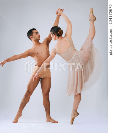 Ballet dancing couple, studio and holding hands for balance, finesse and art movement for beauty in class. Young dancer team, performance or man with woman in class for fitness, teamwork and focus 134170676