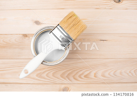 Color of 2026 year dancer in the white cloud. Paint brush dipping into white paint can on wood 134170816