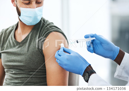 Covid, vaccine and man doctor with cotton in healthcare consultation for safety or prevention. Corona, vaccination and arm injection for guy person by physician in gloves for hospital compliance 134171036