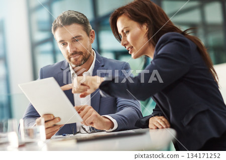 Collaboration, tablet and planning with a business team in the office for research on a company project. Teamwork, technology and brainstorming with corporate people talking about strategy at work 134171252