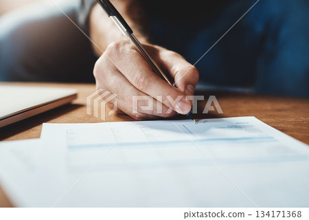 Hands, document and man writing on paper for home, loan or investment in house. Signature, paperwork and male person with legal, contract or agreement for property, real estate or rental compliance Hands, document and man writing on paper for home, loan or investment in house. Signature, paperwork and male person with legal, contract or agreement for property, real estate or rental compliance 134171368