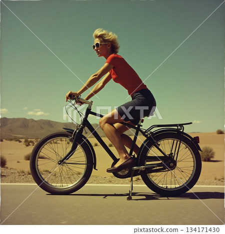 AI generated Female cyclist enjoys freedom on vintage cruiser along sunlit mountainous 134171430