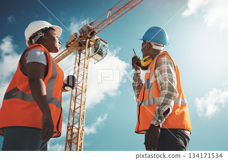 Walkie talkie, crane and engineering team at construction site for building project and teamwork. Black woman and man manager together for engineer communication or safety inspection outdoor 134171534