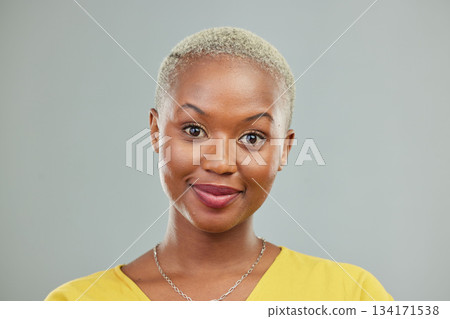 Happy, portrait and woman in studio with confidence, cool and edgy against a grey or wall background. Headshot, face and young african female model smile, cheerful and proud, satisfied and beautiful 134171538