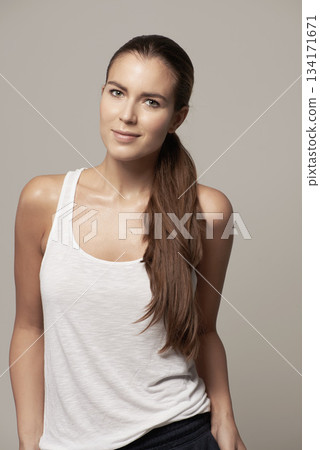Fashion, casual and portrait of woman isolated on studio background with smile, long hair and cool clothes. Happy young model or beautiful person from Germany standing in trendy outfit for promotion Fashion, casual and portrait of woman isolated on studio background with smile, long hair and cool clothes. Happy young model or beautiful person from Germany standing in trendy outfit for promotion 134171671