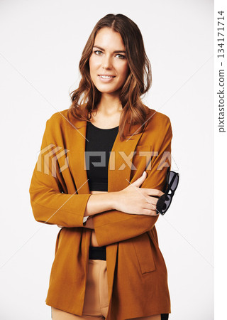 Portrait, happy woman and arms crossed in white background, casual style and confident attitude. Beautiful young female model, smile and posing in studio with good mood, happiness and fashion clothes Portrait, happy woman and arms crossed in white background, casual style and confident attitude. Beautiful young female model, smile and posing in studio with good mood, happiness and fashion clothes 134171714