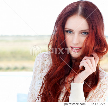Redhead, beauty and woman portrait outdoor with ginger hairstyle and treatment. Hair care, female person youth and young model face with confidence and beautiful hairstylist haircut outside alone Redhead, beauty and woman portrait outdoor with ginger hairstyle and treatment. Hair care, female person youth and young model face with confidence and beautiful hairstylist haircut outside alone 134171724