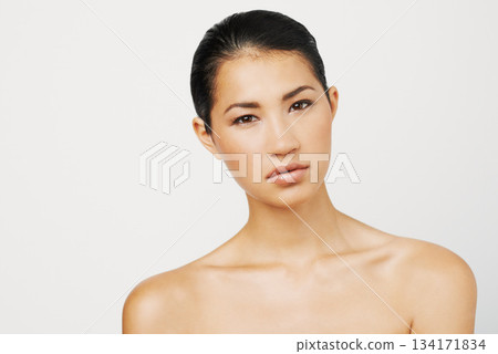Natural beauty, Asian woman and portrait with skincare and dermatology with mockup. Isolated, white background and young female person with face makeup and skin glow from cosmetics and treatment 134171834