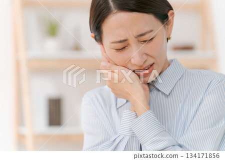 A woman with a toothache A woman with a toothache 134171856