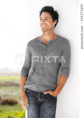 Happy, thinking and handsome man in nature for weekend break, peace and calm in Portugal. Smile, ideas and an attractive person with fashion, clothes and happiness in an outdoor natural environment Happy, thinking and handsome man in nature for weekend break, peace and calm in Portugal. Smile, ideas and an attractive person with fashion, clothes and happiness in an outdoor natural environment 134171895