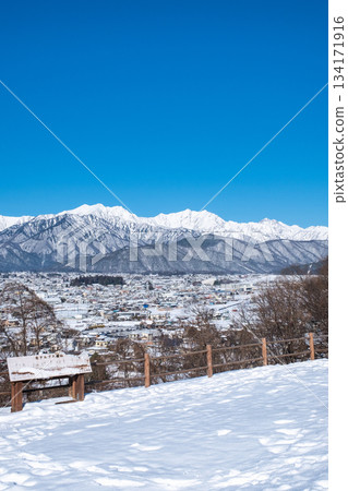 View of the Northern Alps from Omachi Park (winter) 134171916