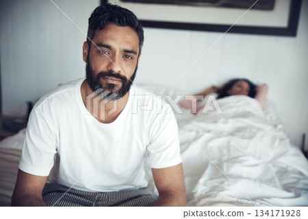 Sad, depression and portrait of a man on a bed with wife sleeping in the morning. Upset, depressed and a mature male person looking tired, frustrated or unhappy with a woman in the bedroom for sleep Sad, depression and portrait of a man on a bed with wife sleeping in the morning. Upset, depressed and a mature male person looking tired, frustrated or unhappy with a woman in the bedroom for sleep 134171928