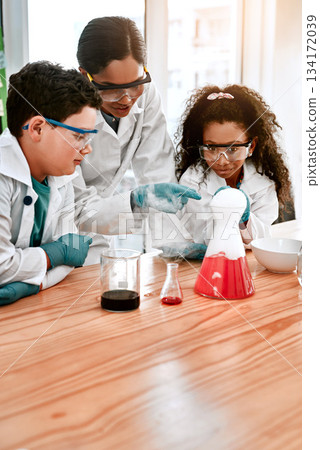 Children, science teacher and experiment with beaker for learning, education and knowledge in school classroom. Chemistry educator, students and kids studying chemical results, project and fun test Children, science teacher and experiment with beaker for learning, education and knowledge in school classroom. Chemistry educator, students and kids studying chemical results, project and fun test 134172039